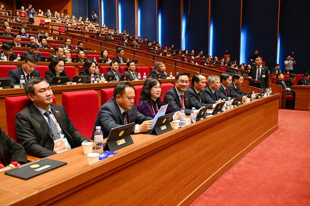 Đoàn đại biểu làm việc tại phiên thảo luận ở hội trường về các Văn kiện Đại hội ngày 21/1